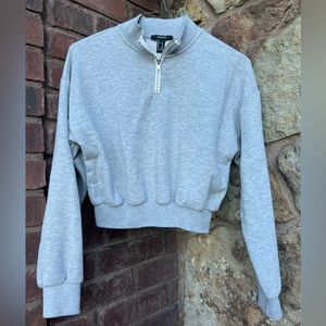 Women’s medium (fits like a small) cropped half zip gray pull over